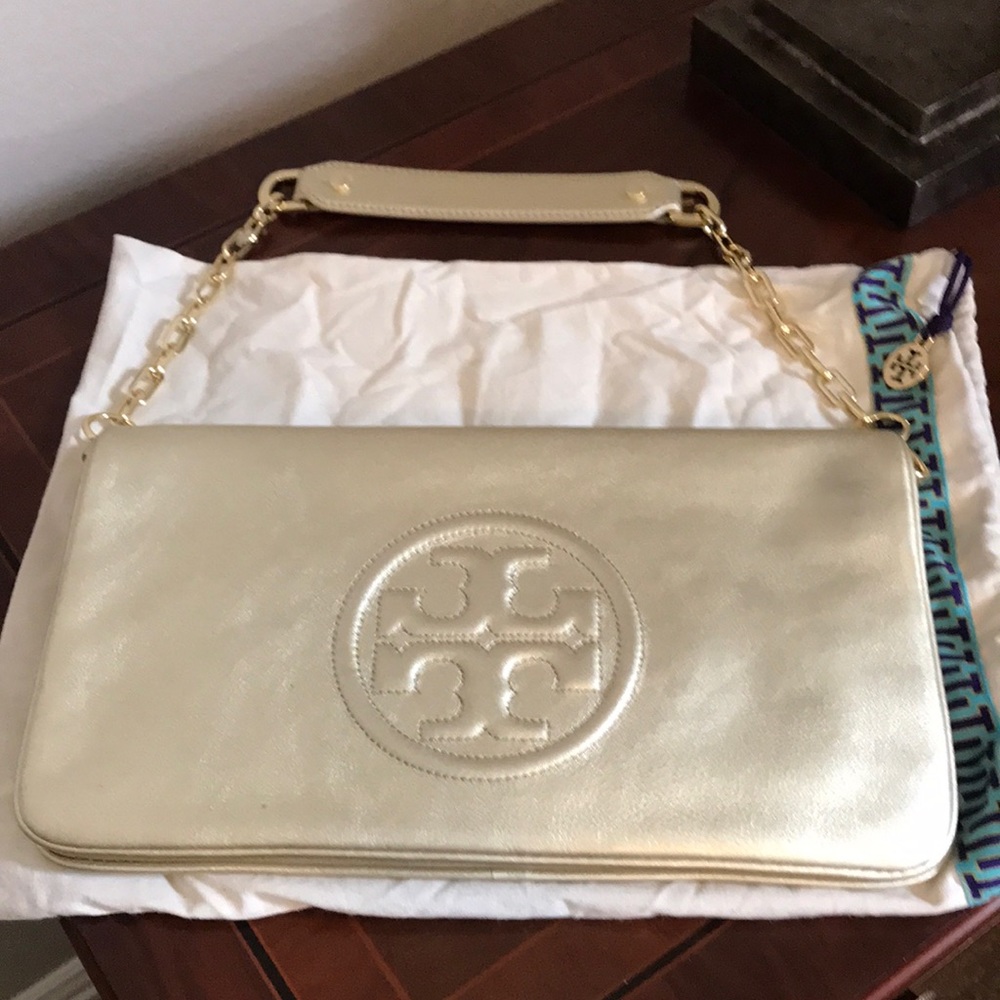 Tory Burch leather clutch ,detachable link shoulder strap including duster bag